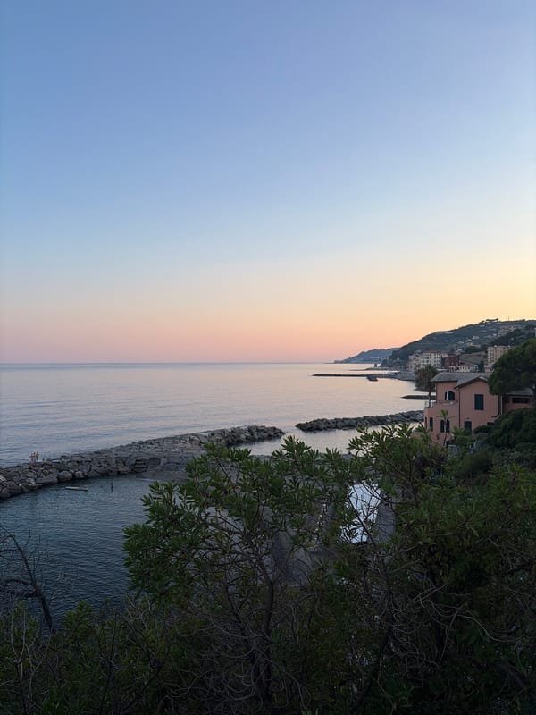 Sitting on the rocks at sunset, Imperia coastline