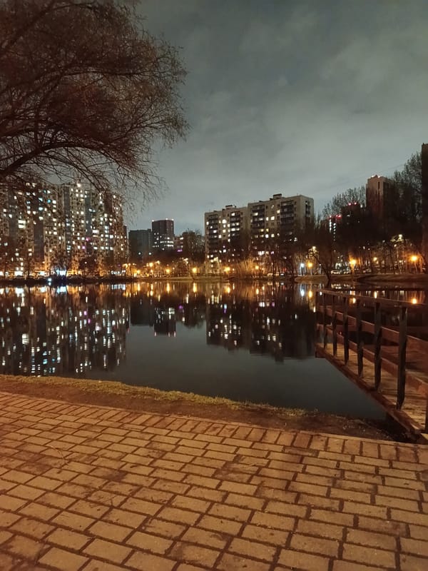 Moscow nighttime cityscape captured with lights reflecting on water