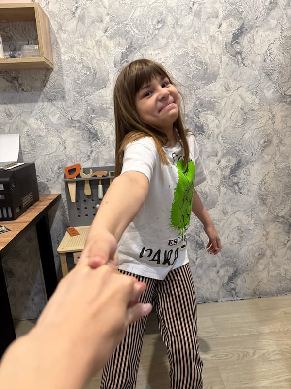 Mother and child share quiet afternoon moments in Rusanovo home