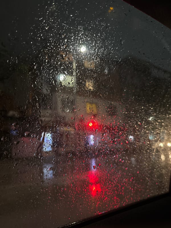 Rainy evening observed through window in Haskovo, Bulgaria