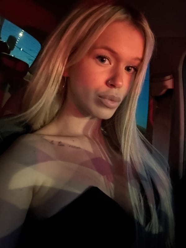Passenger seat, Saint Petersburg night, city lights in the background