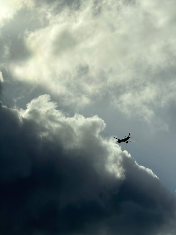 Aircraft spotted flying through mixed cloud formations over Miami