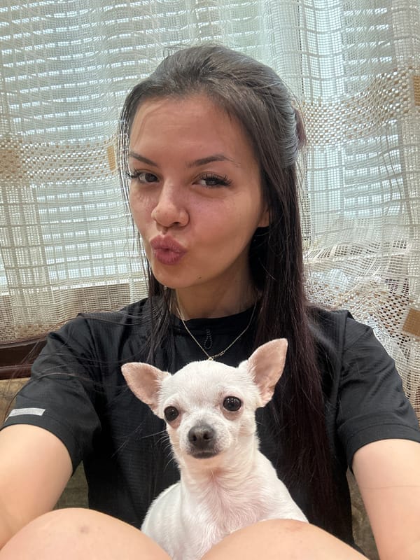 Woman takes playful selfies with white Chihuahua in Bulgaria