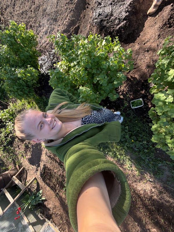 Woman gardens and takes selfies in Chaikovsky, Russia