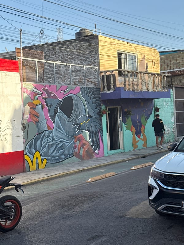 Evening walk documented street art and cafés in Cholula