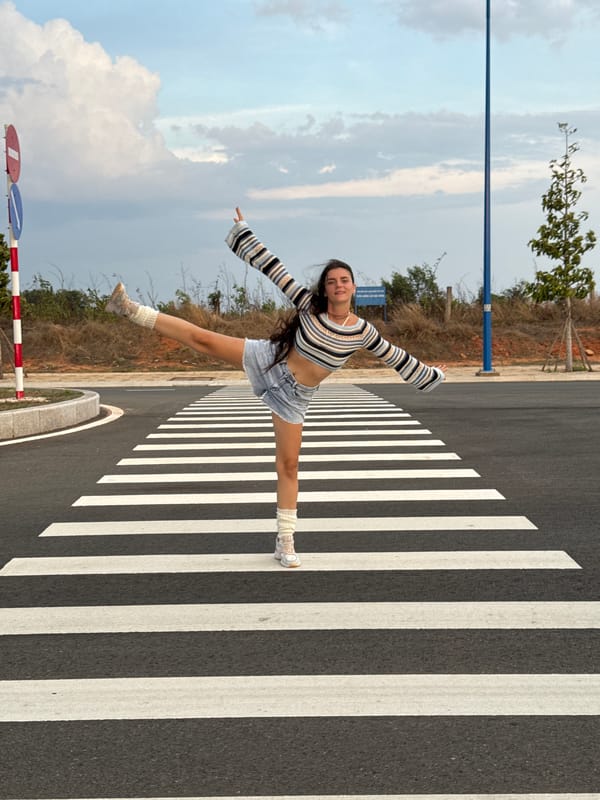 Woman poses on crosswalks during photo session in Mui Ne