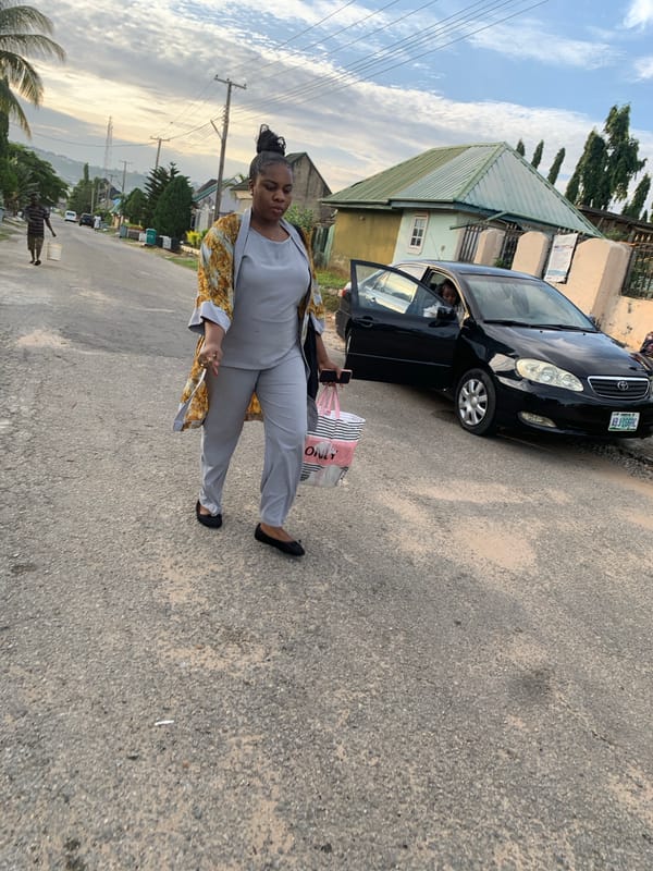Morning street scenes and portraits in Abuja residential area