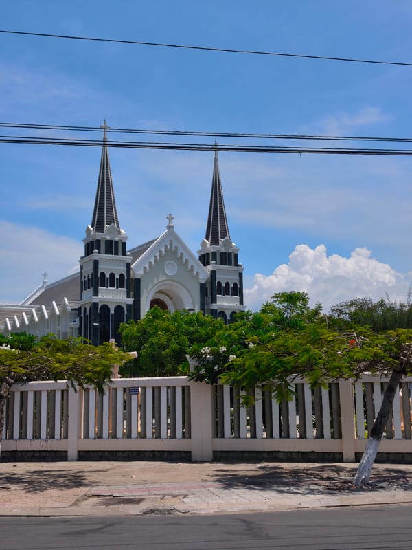 Morning walkthrough of Nha Trang's streets, beach, and a high-rise hotel