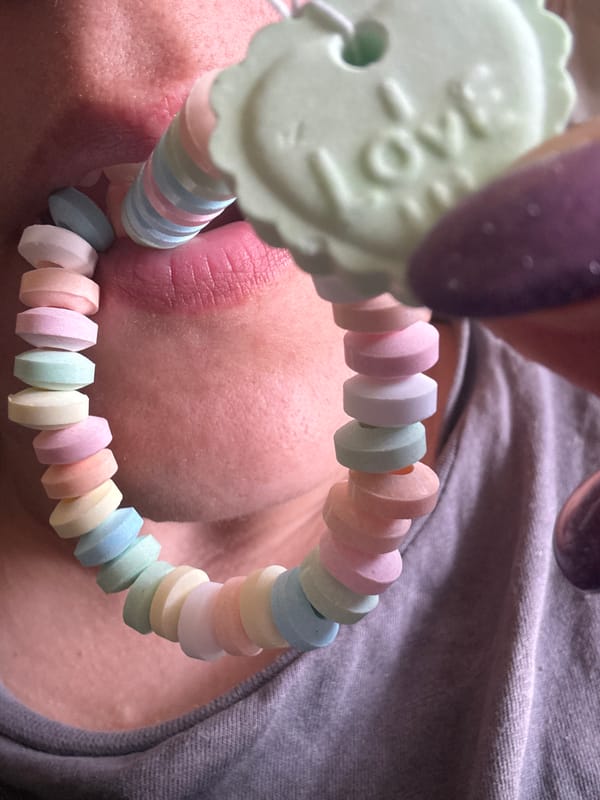 Person documents playful moments with candy and toys in Dmitrov