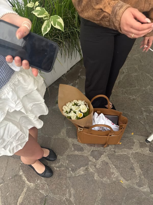Graduation ceremony and social gathering documented in Milan