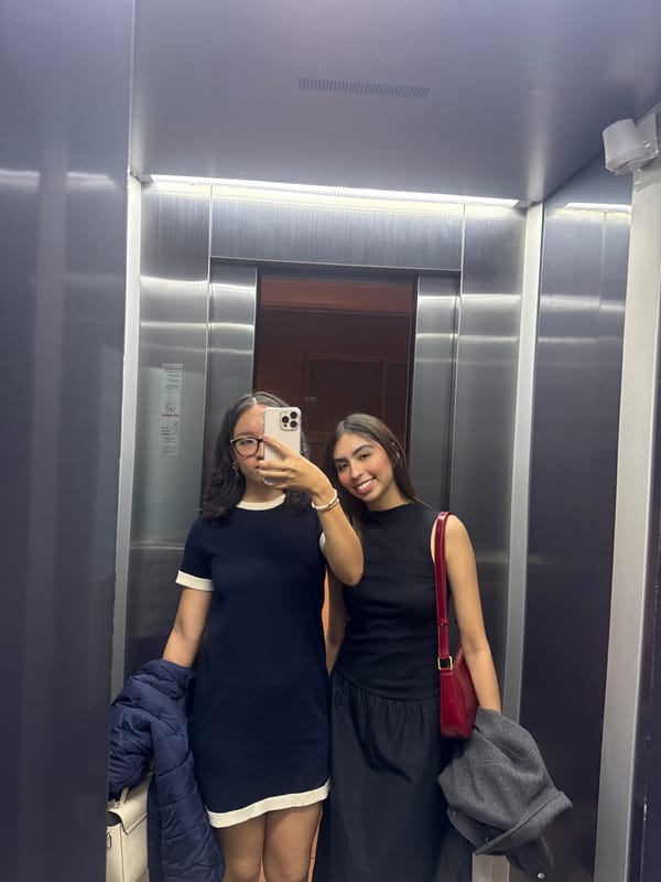 Young woman documents evening with selfies and flowers