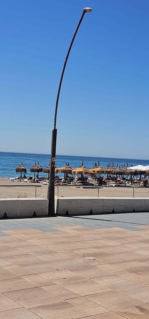 Morning stroll through sunny Estepona promenade and streets documented