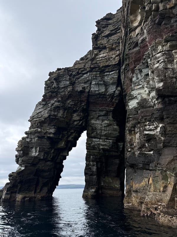 Shetland sea stacks, arches, and stratified cliffs up close