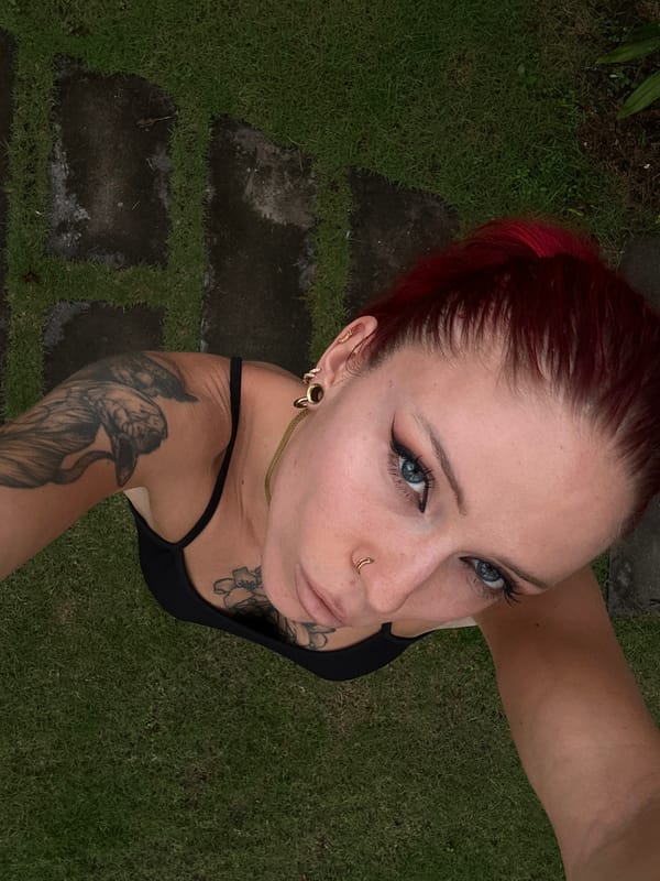 Tattooed woman photographed multiple times in North Kuta morning session