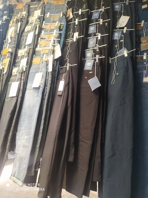 Denim jeans on display at a Karakol clothing stall