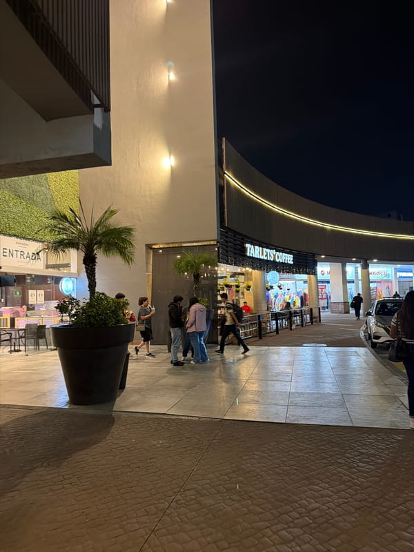 Evening street life documented around Cholula café district