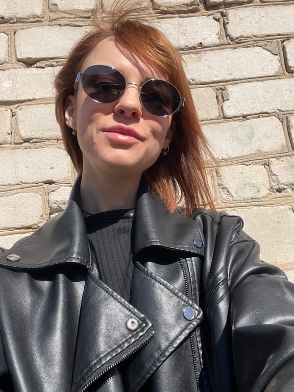 Woman photographed at garage complex in Chaikovsky, Russia