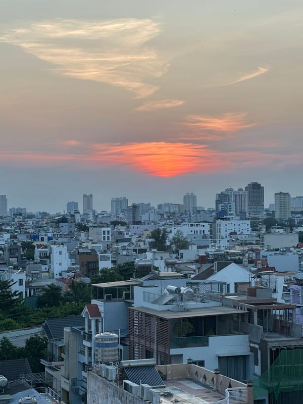 Sunset panorama documented over Ho Chi Minh City skyline