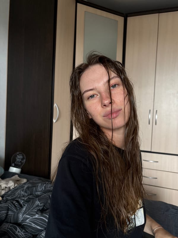 Post-shower selfies and morning coffee in a Perm bedroom