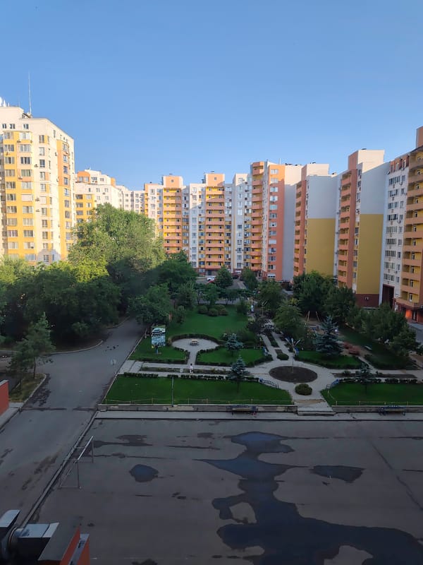 Chișinău apartment courtyard on a July morning