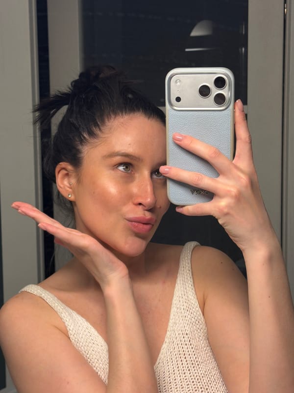 Woman takes mirror selfie in Khimki, Russia