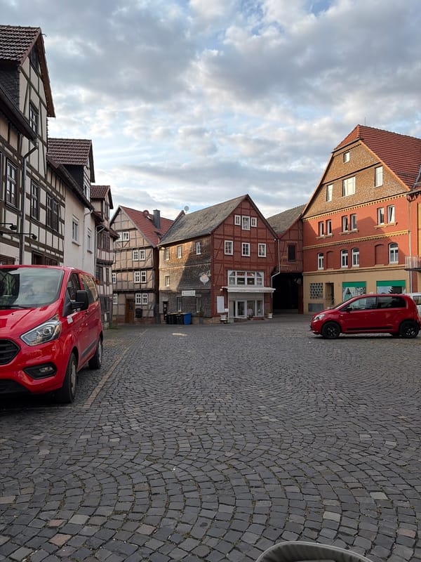 Cobblestone streets and folk art in a historic European town square