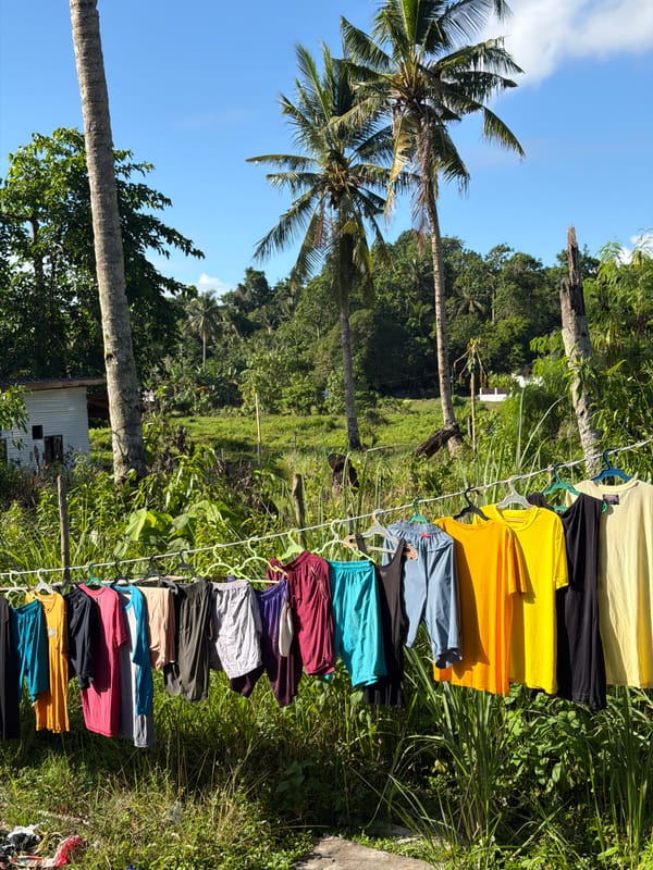 Laundry hanging on clothesline observed in tropical General Luna