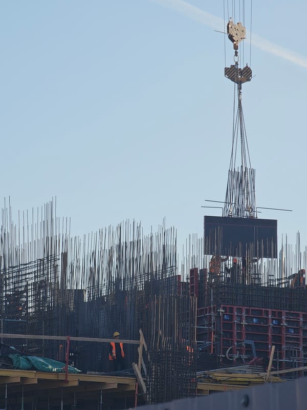 Moscow workday scenes: construction, carpentry, metro commute