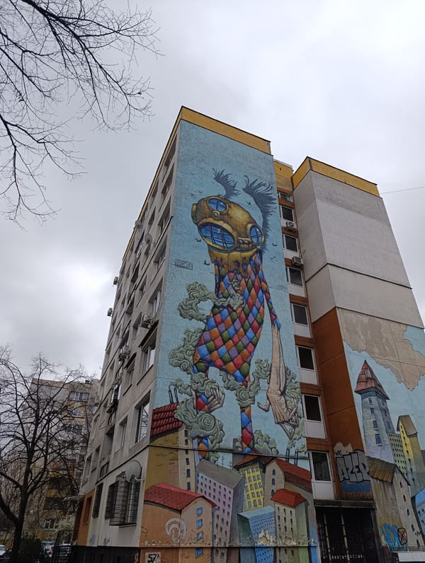 Low-flying aircraft observed over Sofia amid street art documentation