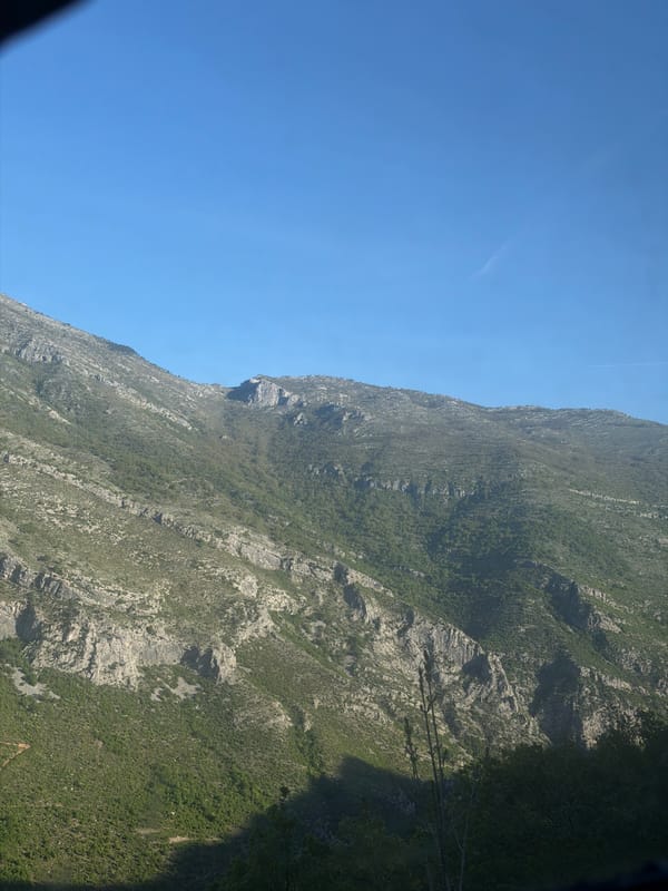 Morning light illuminates Montenegro mountain terrain in Pelev Brijeg