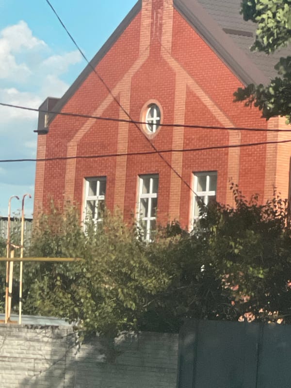 Driving tour through central Poltava showing churches and commercial areas