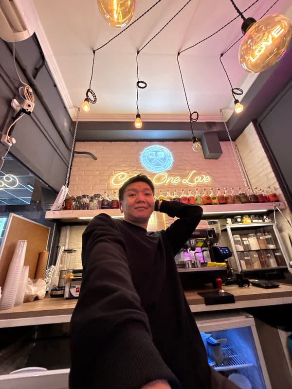 Selfie at a Moscow bar with neon lights behind