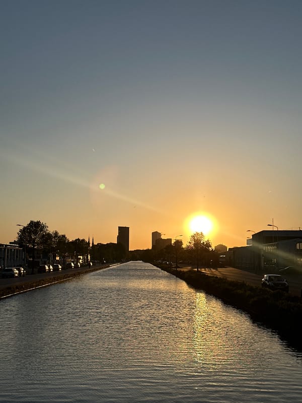 Peaceful sunset scene captured along Eindhoven waterway