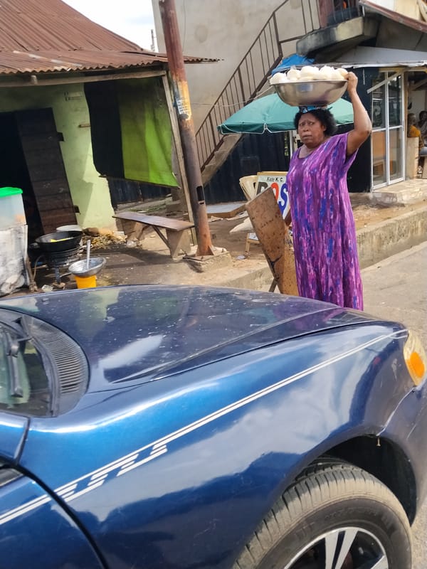 Daily street life documented in Aba, Nigeria commercial district