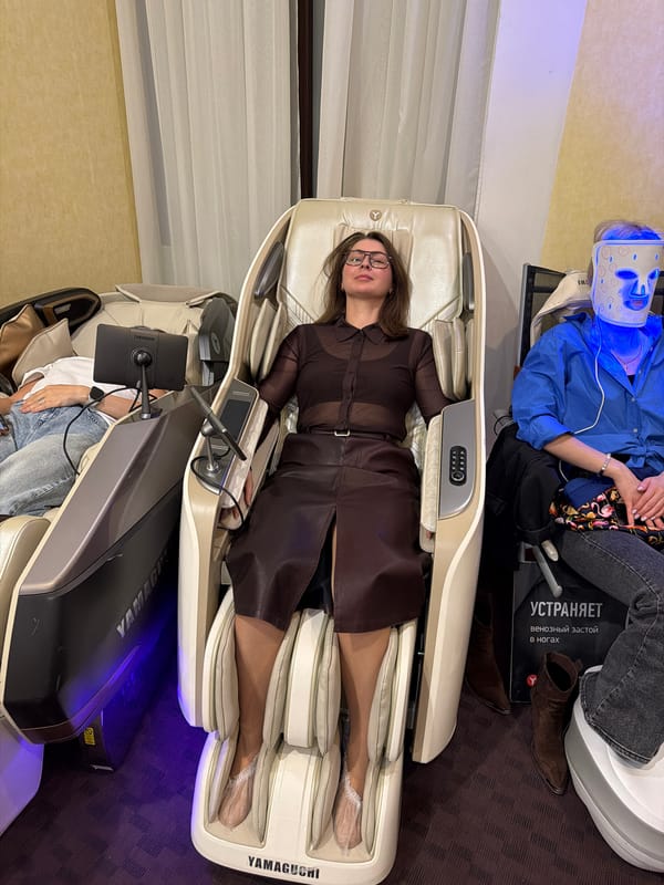 Woman uses massage chair in Izhevsk spa facility