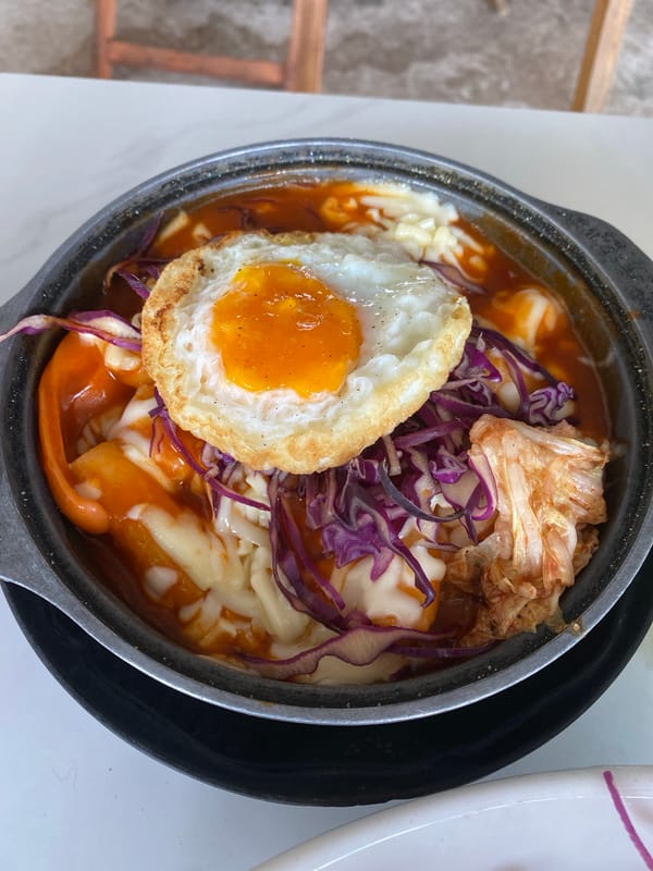 Women share Korean-Vietnamese fusion breakfast in Mũi Né café