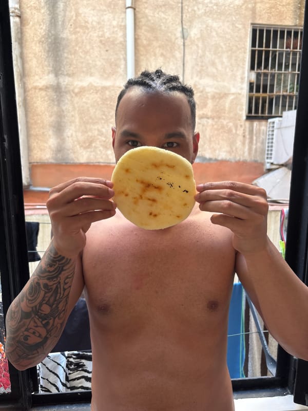 Morning arepa breakfast captured across Barcelona apartment