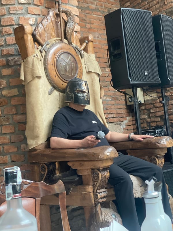 Helmeted Person Spotted on Wooden Throne in Lukovit, Bulgaria