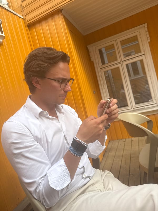 Casual outdoor drinking gathering observed in Oslo residential area