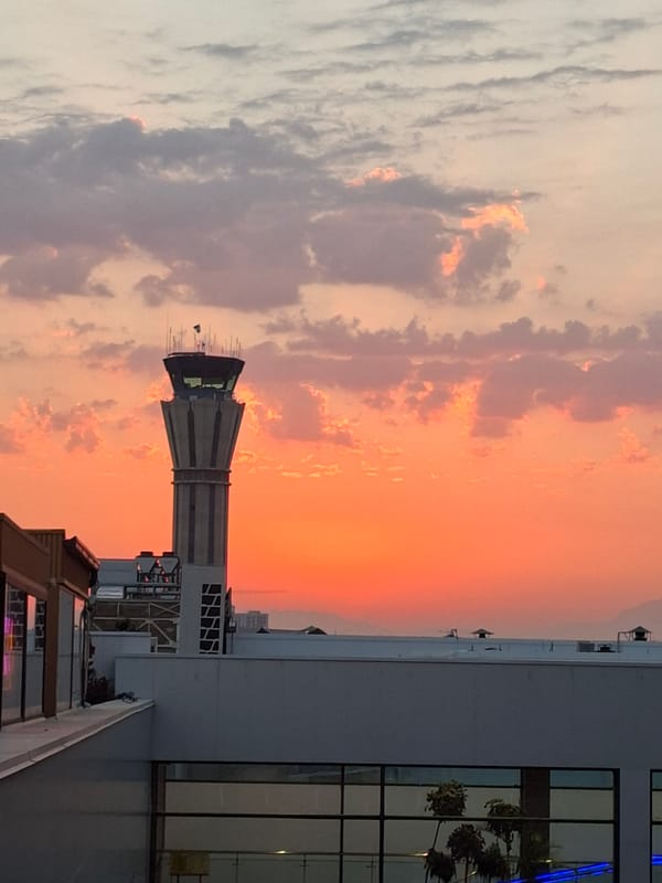 Tashkent airport control tower at sunset
