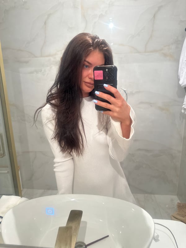 Woman takes bathroom selfie in Moscow
