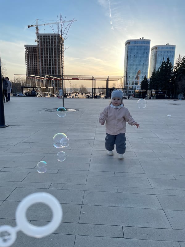 Child plays with soap bubbles in Izhevsk plaza