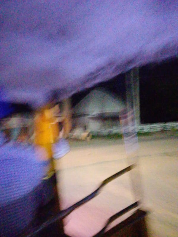 Evening hours drifting through Kuson's lit streets by tuk-tuk