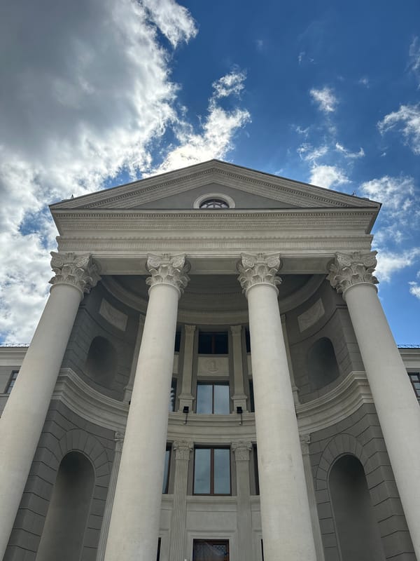 Minsk street-level architecture and everyday details, summer morning