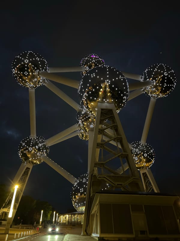 Brussels Atomium illuminated at night with decorative lighting