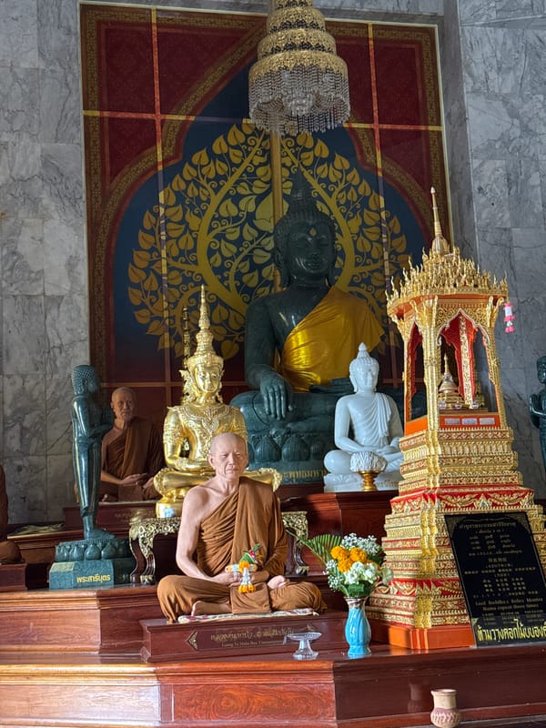 Temple grounds and city views from a Phuket morning