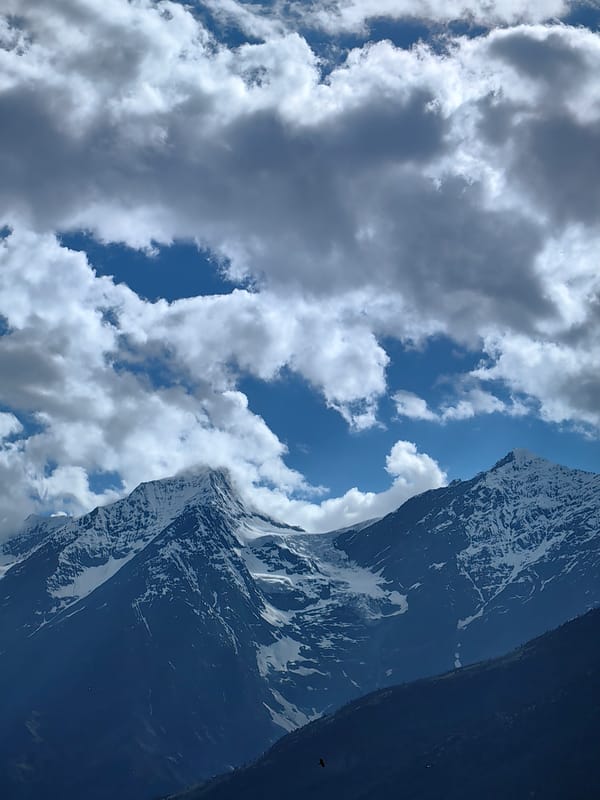 Morning in Keylong: peaks, village terraces, and open skies