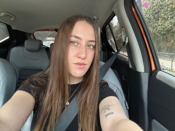 Woman Takes Selfies in Car During Mexico City Afternoon