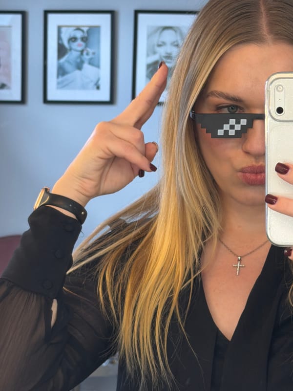 Woman in pixelated sunglasses spotted during eyewear trend in Riga