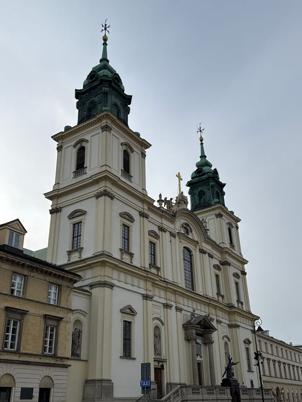 Baroque and neoclassical landmarks along central Warsaw's historic street